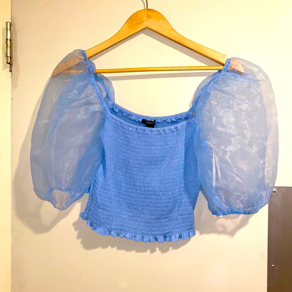baby blue blouse with puffed sleeves
